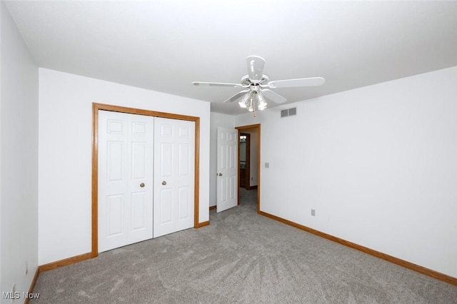 452 Herbert Rd, Akron, OH 44312 - unfurnished bedroom with carpet floors, a closet, and a ceiling fan