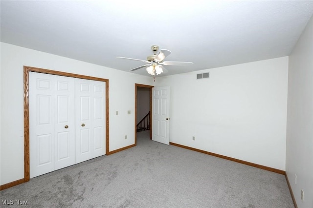 452 Herbert Rd, Akron, OH 44312 - unfurnished bedroom featuring carpet floors, a closet, and ceiling fan