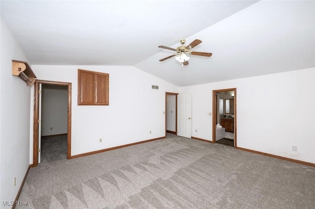 452 Herbert Rd, Akron, OH 44312 - unfurnished bedroom with lofted ceiling, light carpet, connected bathroom, and a ceiling fan