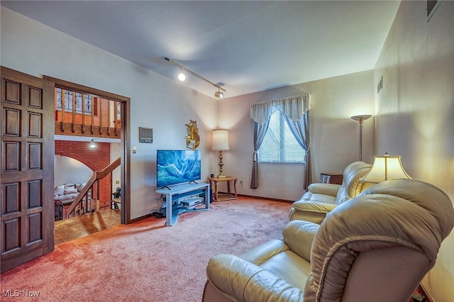 68 Caravel Pl, Wintersville, OH 43953 - carpeted living room featuring baseboards and track lighting