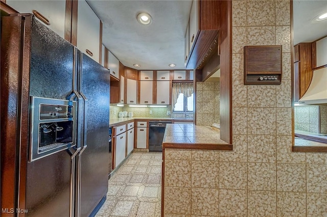 68 Caravel Pl, Wintersville, OH 43953 - kitchen with black appliances, backsplash, recessed lighting, and light floors