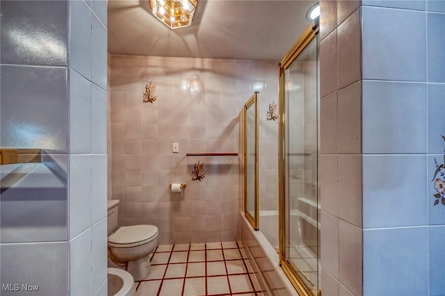 68 Caravel Pl, Wintersville, OH 43953 - bathroom featuring tile walls, tile patterned flooring, a bidet, and shower / bath combination with glass door