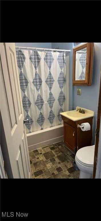 607 N 8th St, Cambridge, OH 43725 - bathroom featuring shower / bathtub combination with curtain and vanity
