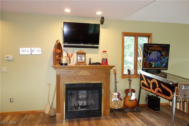 3545 Malley Ave, Coventry Township, OH 44319 - living area with wood finished floors, a fireplace, and recessed lighting