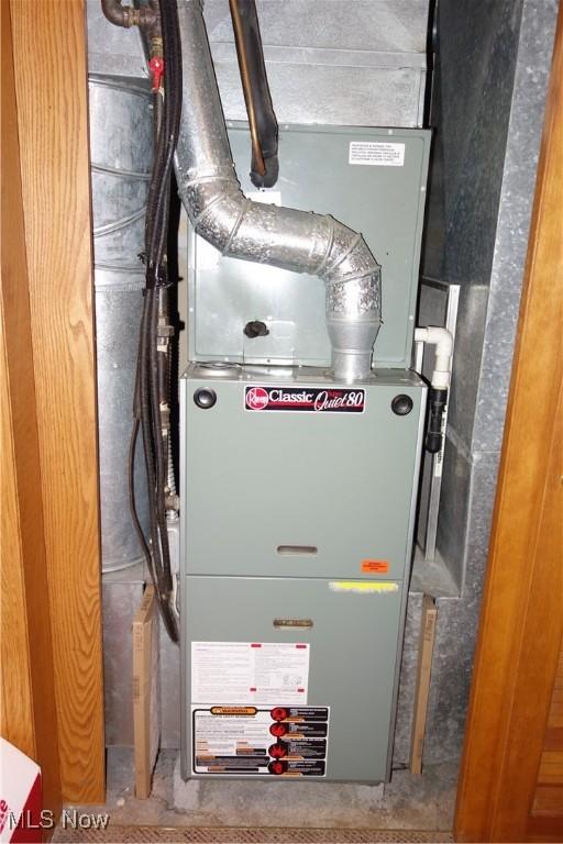 3545 Malley Ave, Coventry Township, OH 44319 - utility room featuring heating unit