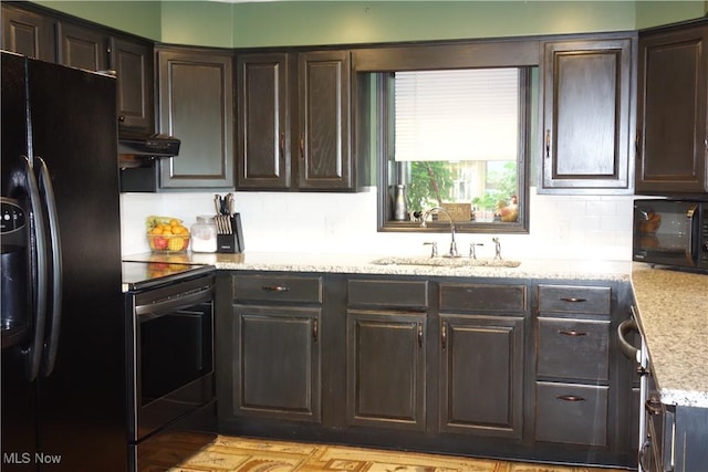 3545 Malley Ave, Coventry Township, OH 44319 - kitchen with fridge with ice dispenser, stainless steel range with electric stovetop, black microwave, dark brown cabinetry, and backsplash
