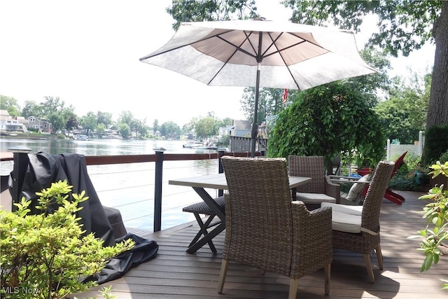 3545 Malley Ave, Coventry Township, OH 44319 - deck featuring outdoor dining space and a water view