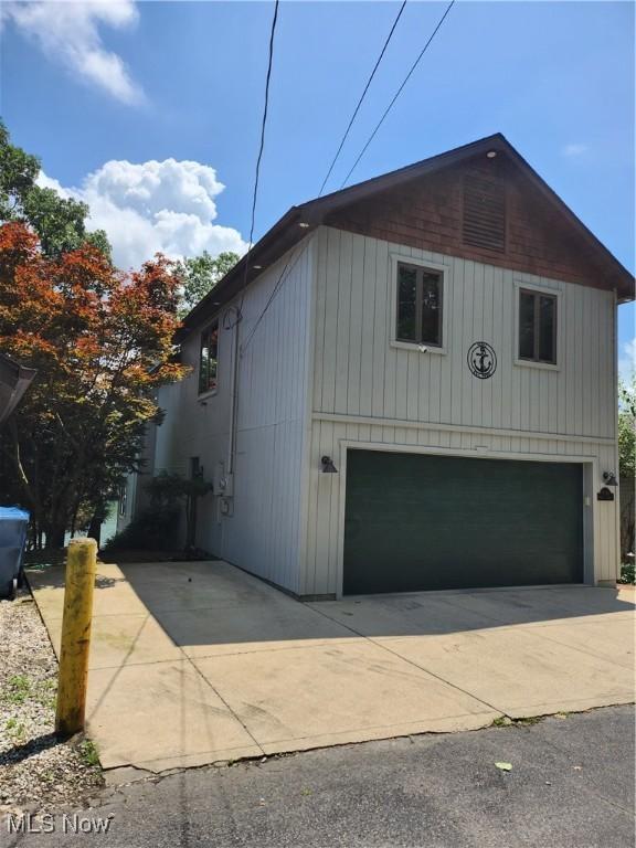 3545 Malley Ave, Coventry Township, OH 44319 - view of front of property with an attached garage and driveway