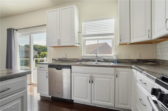 120 Glenridge Cir, Tallmadge, OH 44278 - kitchen with stainless steel dishwasher, range, healthy amount of natural light, and white cabinets