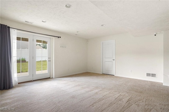 120 Glenridge Cir, Tallmadge, OH 44278 - spare room with a textured ceiling, light carpet, and recessed lighting