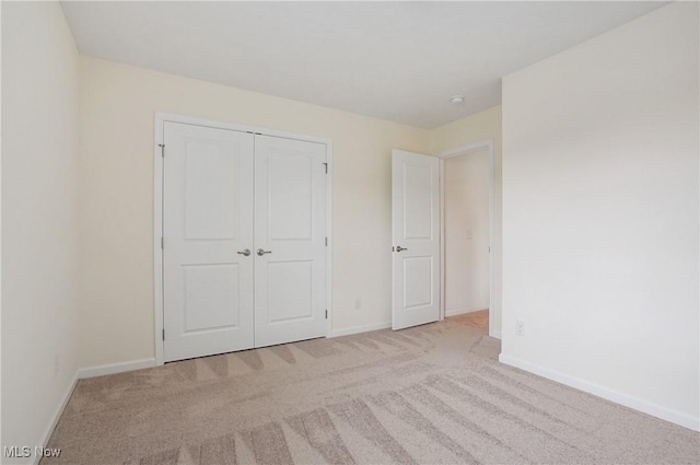 120 Glenridge Cir, Tallmadge, OH 44278 - unfurnished bedroom featuring carpet flooring and a closet