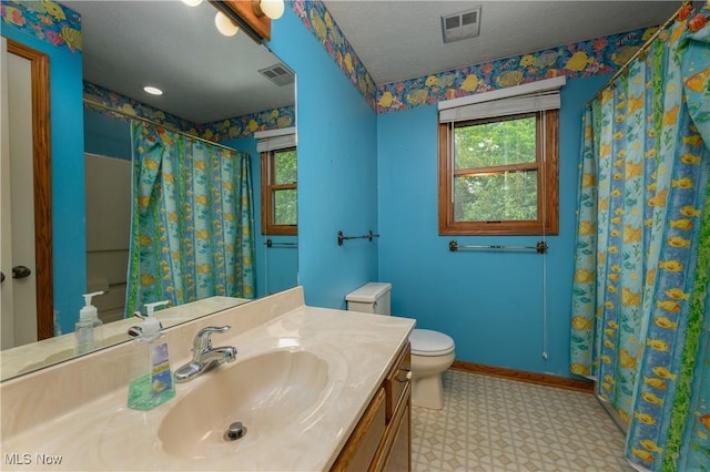 6104 Shipslanding Ave NW, Canton, OH 44718 - bathroom with vanity, tile patterned floors, a shower with shower curtain, and wallpapered walls