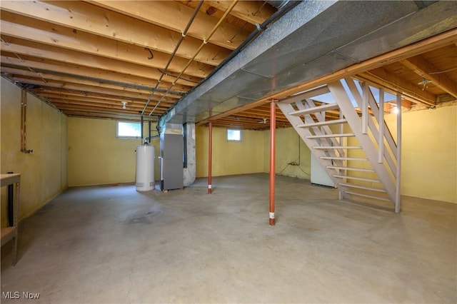 6104 Shipslanding Ave NW, Canton, OH 44718 - basement with heating unit, stairway, and water heater