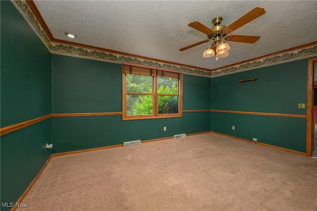 6104 Shipslanding Ave NW, Canton, OH 44718 - carpeted spare room with a textured ceiling, a ceiling fan, and crown molding