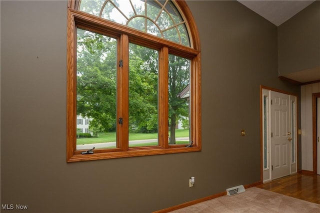 6104 Shipslanding Ave NW, Canton, OH 44718 - empty room with baseboards and lofted ceiling