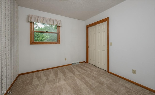 6104 Shipslanding Ave NW, Canton, OH 44718 - spare room with carpet floors and baseboards