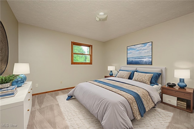 6104 Shipslanding Ave NW, Canton, OH 44718 - bedroom featuring baseboards and a textured ceiling