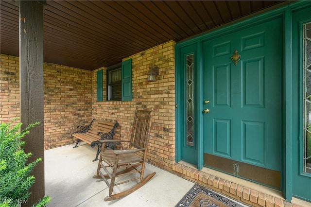 6104 Shipslanding Ave NW, Canton, OH 44718 - view of exterior entry featuring covered porch and brick siding
