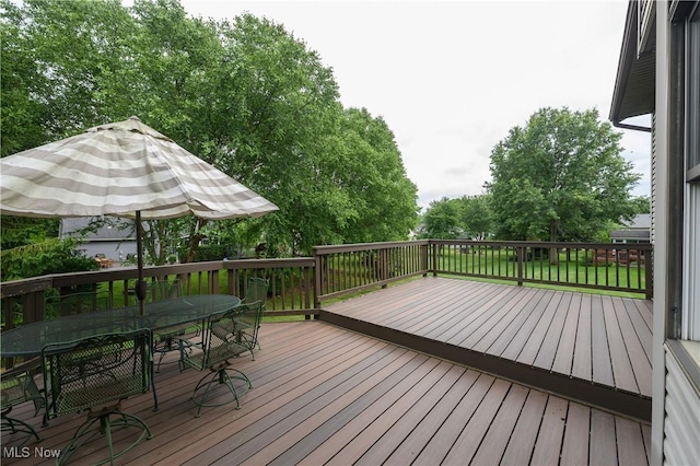 6104 Shipslanding Ave NW, Canton, OH 44718 - wooden deck featuring outdoor dining space