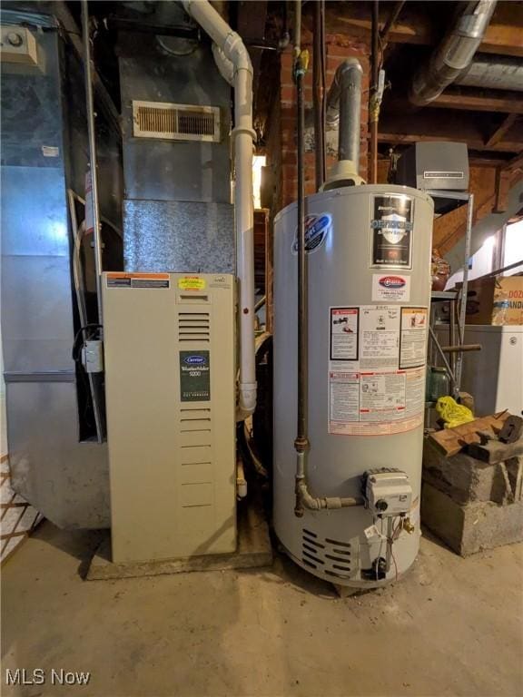 7567 Inland Dr, Olmsted Falls, OH 44138 - utility room with water heater