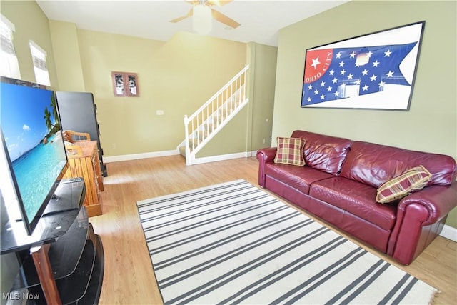5500 Courtland Ct, Cleveland, OH 44102 - living room with stairway, wood finished floors, and a ceiling fan