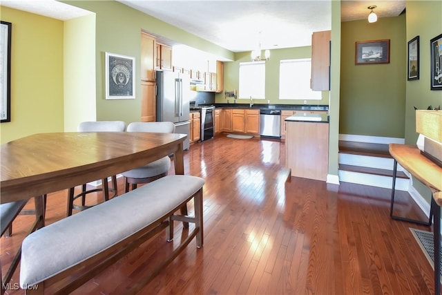 5500 Courtland Ct, Cleveland, OH 44102 - dining space with dark wood-type flooring and baseboards