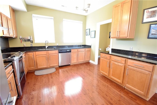 5500 Courtland Ct, Cleveland, OH 44102 - kitchen featuring stainless steel dishwasher, electric stove, light wood-style floors, and light brown cabinetry