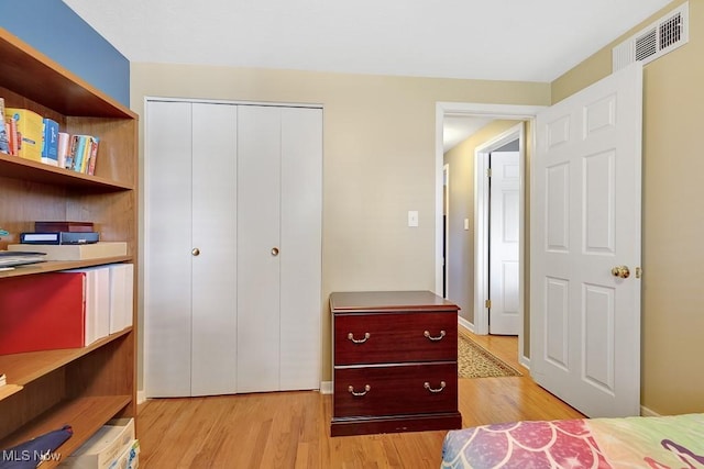 5982 Forest Ridge Dr, North Olmsted, OH 44070 - bedroom with light wood finished floors and a closet