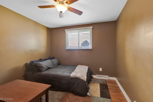 5982 Forest Ridge Dr, North Olmsted, OH 44070 - bedroom featuring wood finished floors and a ceiling fan