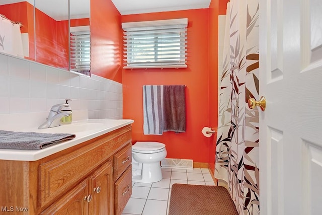 5982 Forest Ridge Dr, North Olmsted, OH 44070 - bathroom featuring vanity, tile patterned flooring, tasteful backsplash, and curtained shower