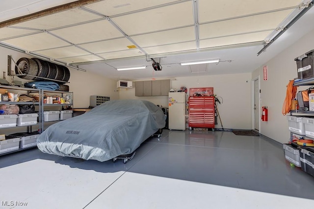 5982 Forest Ridge Dr, North Olmsted, OH 44070 - garage with freestanding refrigerator