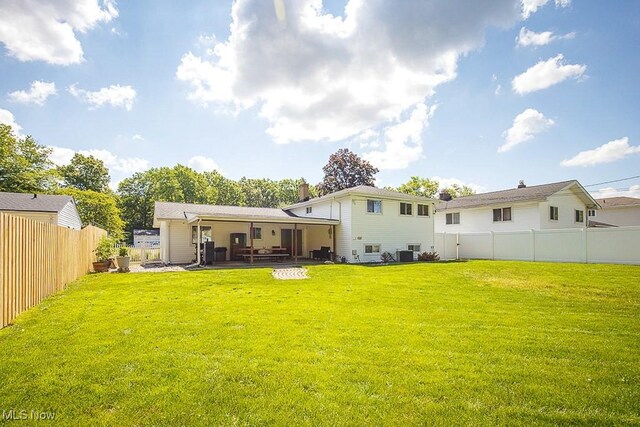 5982 Forest Ridge Dr, North Olmsted, OH 44070 - back of house featuring a fenced backyard and a patio area