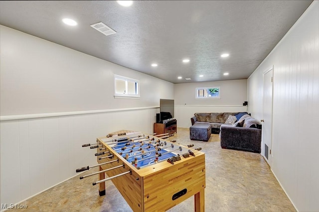 5982 Forest Ridge Dr, North Olmsted, OH 44070 - recreation room with a decorative wall, recessed lighting, and wainscoting