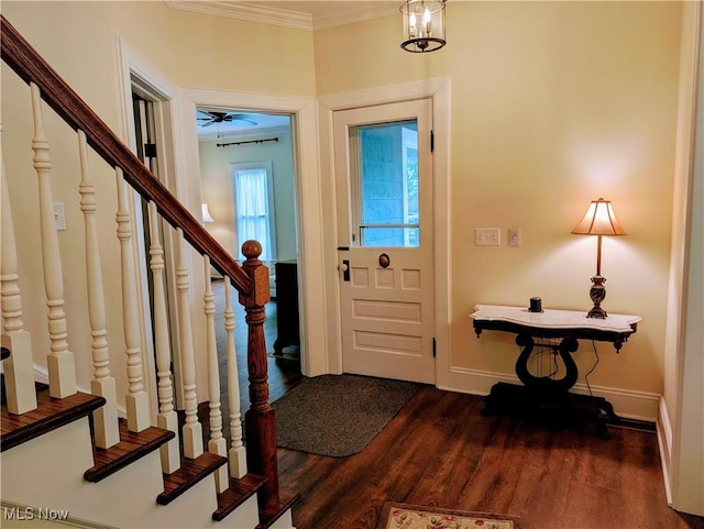 136 W Church St, Newton Falls, OH 44444 - foyer entrance with stairway, dark wood-style flooring, and crown molding