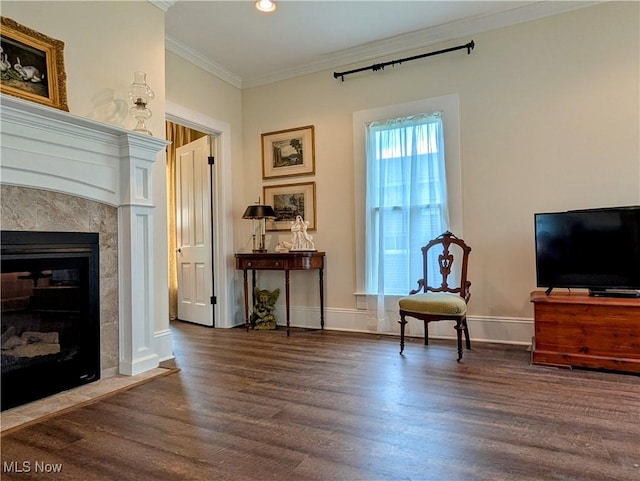 136 W Church St, Newton Falls, OH 44444 - living area with wood finished floors, crown molding, a fireplace, and recessed lighting