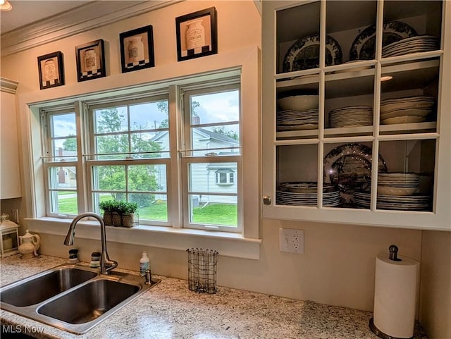 136 W Church St, Newton Falls, OH 44444 - kitchen featuring ornamental molding and light stone counters