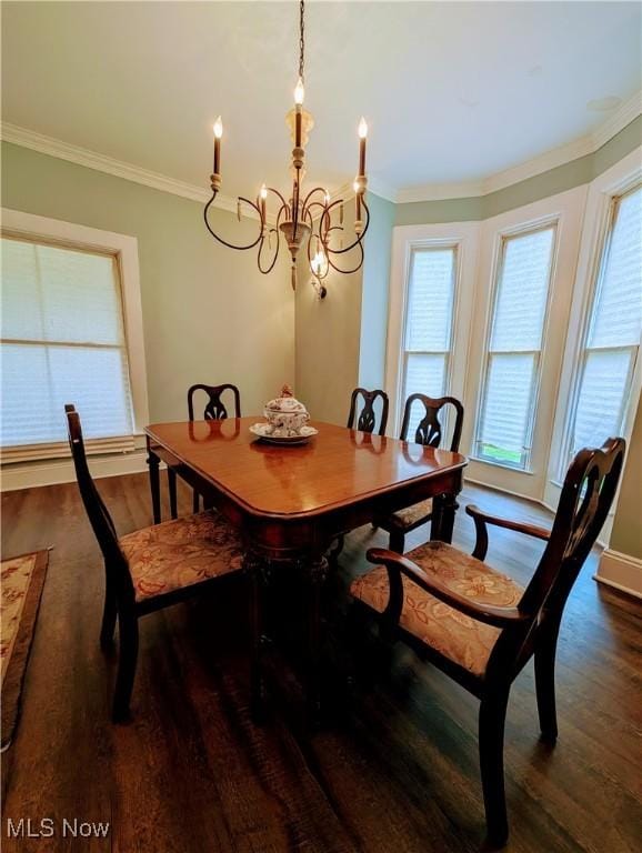 136 W Church St, Newton Falls, OH 44444 - dining space featuring a chandelier, wood finished floors, and ornamental molding