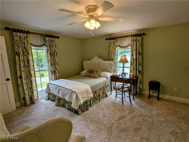 136 W Church St, Newton Falls, OH 44444 - carpeted bedroom with multiple windows, access to outside, and ceiling fan