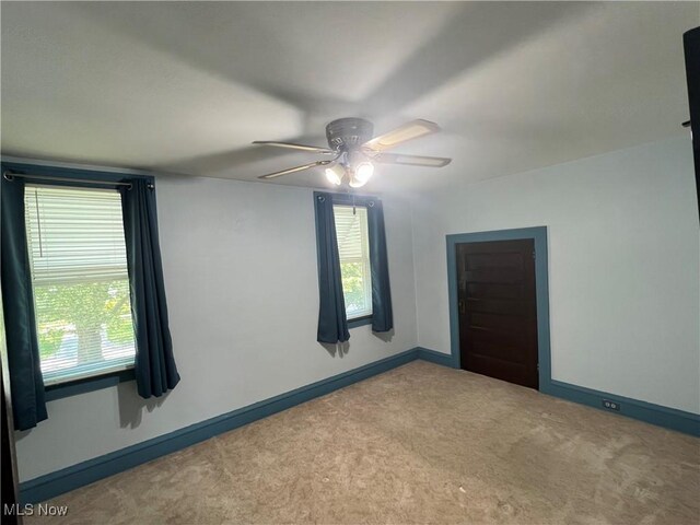 3731 Washington Park Blvd, Newburgh Heights, OH 44105 - unfurnished room with carpet flooring and ceiling fan