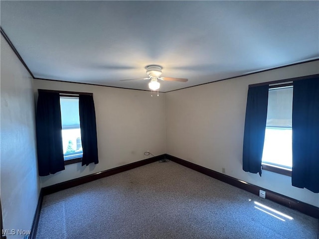 3731 Washington Park Blvd, Newburgh Heights, OH 44105 - carpeted spare room featuring ceiling fan and baseboards