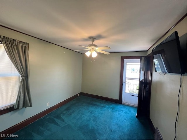 3731 Washington Park Blvd, Newburgh Heights, OH 44105 - unfurnished room with ceiling fan and dark colored carpet