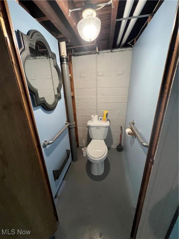 3731 Washington Park Blvd, Newburgh Heights, OH 44105 - bathroom featuring concrete floors and toilet