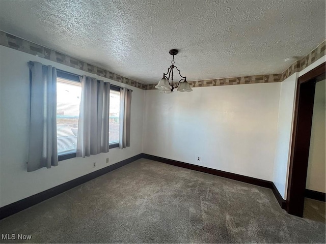 3731 Washington Park Blvd, Newburgh Heights, OH 44105 - carpeted spare room featuring a chandelier and a textured ceiling