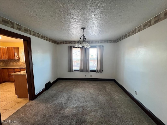 3731 Washington Park Blvd, Newburgh Heights, OH 44105 - empty room featuring light colored carpet and a textured ceiling