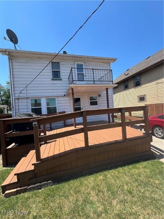3731 Washington Park Blvd, Newburgh Heights, OH 44105 - back of property with a balcony and a wooden deck
