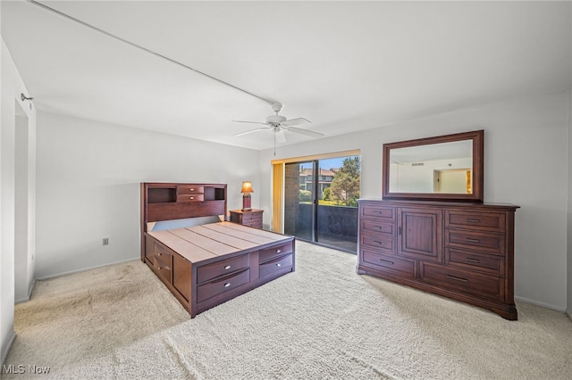 140 Fox Hollow Dr Unit 206C, Mayfield Heights, OH 44124 - bedroom with access to exterior, light colored carpet, and a ceiling fan