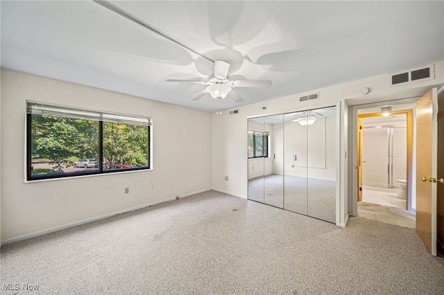 140 Fox Hollow Dr Unit 206C, Mayfield Heights, OH 44124 - unfurnished bedroom with a closet and a ceiling fan
