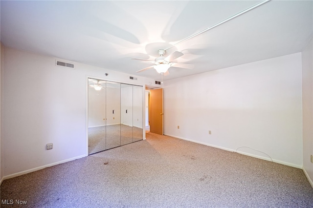 140 Fox Hollow Dr Unit 206C, Mayfield Heights, OH 44124 - unfurnished bedroom featuring light carpet, ceiling fan, and a closet