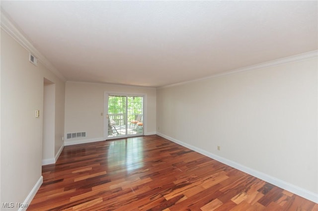 6131 Center St Unit 106, Mentor, OH 44060 - spare room featuring wood finished floors and ornamental molding