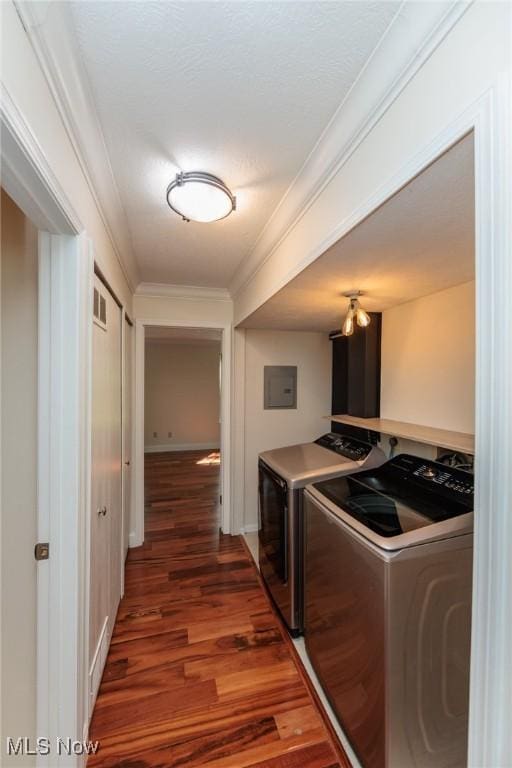 6131 Center St Unit 106, Mentor, OH 44060 - laundry room with independent washer and dryer, electric panel, wood finished floors, and crown molding